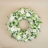 Funeral wreath with roses and gerberas Online