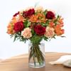 Mixed bouquet of warm orange and red tones Online