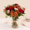 Mixed bouquet of warm orange and red tones Online