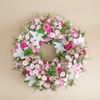 Small premium funeral wreath in shades of pink Online