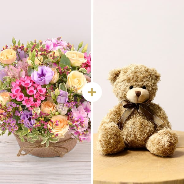 Pastel bloom and teddy bear