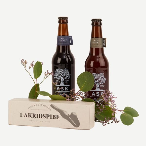 Two ASK beer with a pipe and decoration